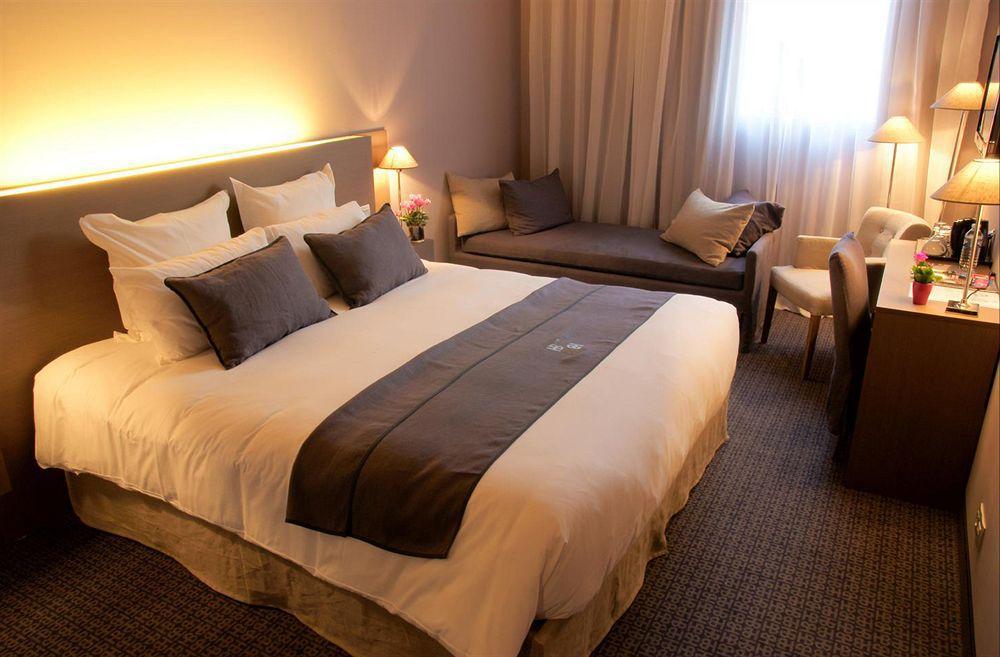 Best Western Hotel De La Breche Ньор Экстерьер фото